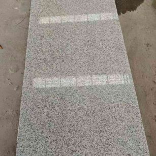 荆门芝麻白光面毛板